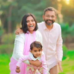A playful and candid moment captured during an outdoor family photoshoot. We love freezing these energetic, happy memories that truly show your family's spirit.