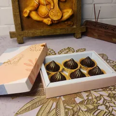 For Ganesh Chaturthi, I offer a modern twist on tradition with these centre-filled chocolate modak tarts. Each tart has a buttery crust and is filled with rich, indulgent chocolate, making it a perfect offering for Bappa.