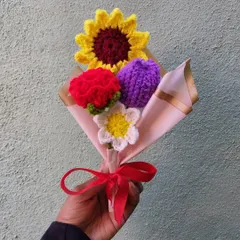 Why give flowers that wilt when you can give forever flowers? This vibrant, handmade crochet bouquet is a perfect example of a lasting gift for any occasion, from birthdays to corporate thank yous.
