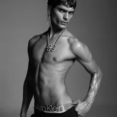 A black and white shot from a Calvin Klein campaign I directed. The goal was to capture a raw, powerful image that highlights both the model's physique and the brand's iconic underwear. This type of high-contrast, minimalist photography is a signature of my menswear work.