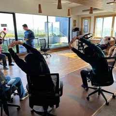 Even a few minutes of mindful movement at your desk can make a difference. In this corporate workshop, I am guiding employees through simple chair based stretches to release neck, shoulder, and back tension accumulated from hours of computer work.
