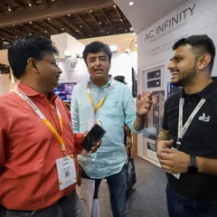 Engaging conversations are what drive innovation. Our team members are pictured here at the Smart Home Expo 2024, discussing our comprehensive home automation and power stabilization products with an interested visitor.