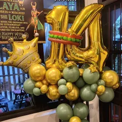 A 14th birthday number bouquet with a fun Loki theme. I can customize bouquets to match any character or theme.