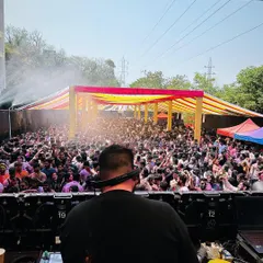 My view from the DJ booth, looking out at a sea of people at the Boom Color Festival. This is what a sold-out Holi party looks like.