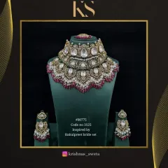 Inspired by Rakul Preet's wedding look, this bridal set features a grand, multi-layered choker with ruby-colored beads.
