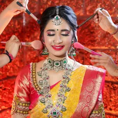 I love capturing the energy behind the scenes. This shot of a bride getting her final makeup touches is full of life and shows the artistry that goes into creating the perfect bridal look.