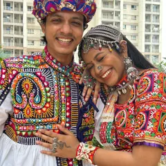 Grab your partner and get ready to dance! I love helping couples find coordinated outfits. This is a great example, showing how traditional embroidery and vibrant colors can create a stunning matching look for Navratri.