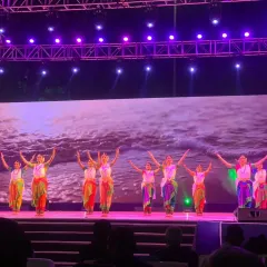 A large ensemble performance at the 17th Pravasi Bharatiya Divas in Indore. I specialize in choreographing for grand stages, uniting over 50 dancers from different classical and folk forms under a single, powerful theme.
