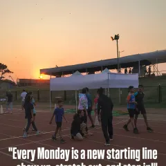 Every Monday is a new starting line. My athletes begin the week with purpose, stretching out against the backdrop of a beautiful sunrise, ready to put in the work.