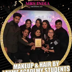 A moment of celebration! Our team receiving an award for their outstanding makeup and hair services at the event. We foster a spirit of teamwork and excellence.