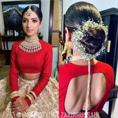 For a classic bridal look, a sleek and clean bun is timeless. Here, I've adorned a perfectly smooth chignon with a traditional baby's breath gajra, creating an elegant and sophisticated style for the main ceremony.