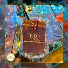 A custom drink tag featuring the couple's hashtag, #rahulgothisnakshatra. It's a simple way to tie the bar experience directly into the wedding's social media presence.
