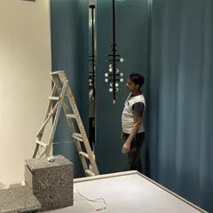 A moment of admiration during the installation of a custom light fixture. Even in the midst of a work-in-progress, we take the time to appreciate how our vision is coming to life.