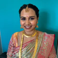 This photo captures the client's beautiful smile and the flawless finish of the makeup. My priority is always to ensure my clients feel like the best version of themselves.