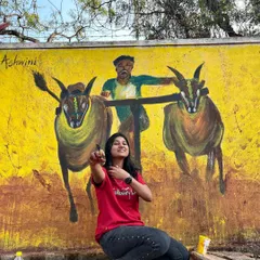 Here I am with a finished mural in Dharwad celebrating local culture. This piece depicts a traditional bull race, painted with bold, energetic colours to capture the excitement of the event. It was a joy to bring this piece of Namma Hubballi-Dharwad to life.