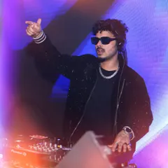 In my element, commanding the console and connecting with the crowd. My job is to read the room and play the tracks that get you and your guests moving. This is my passion, and I bring it to every single event.