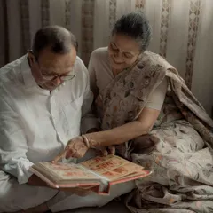 Flipping through their old wedding album, they relived the beginning of their journey. I felt like I was traveling back in time with them, witnessing a story written page by page, year by year.