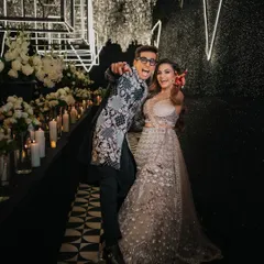 The pure energy and fun of a Sangeet night, as the couple makes a grand, joyful entrance.