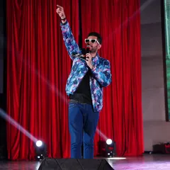 Commanding the stage and mesmerizing the audience. As an anchor, I cherish creating unforgettable experiences and connecting with people at every event I host.