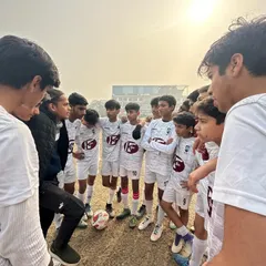 A pre-game huddle where our coach gives final instructions. We ensure our players are tactically prepared and mentally focused for every match.