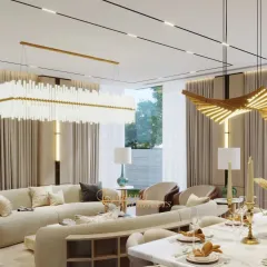 Another view of the open-plan space, highlighting the grand scale of the lighting fixtures and the seamless connection to the outdoor garden area through floor-to-ceiling windows.