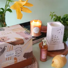 Our Electric Oil Burner Set, shown here with a Darjeeling Lime & Mandarin candle. The same signature fragrances you love in our candles are available in our burner oils for a consistent scent experience.