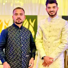 The groom and his brother, both styled by me for the wedding. I created complementary looks that suited their individual styles while ensuring they looked like a cohesive team.