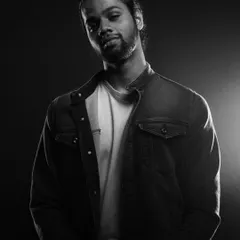 On lead guitar, we have Joshua. A multi-instrumentalist known for his electrifying solos, he brings a rock edge to our fusion sound.