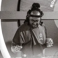 A candid black and white shot of me enjoying the moment during a vinyl set. Even when I'm focused, the joy of playing records always comes through.