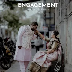 An engagement photo taken on a city street, showing a classic, chivalrous moment. I love finding beauty in everyday locations to make your shoot unique.