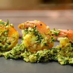 Fiery Thecha Prawns, a spicy Maharashtrian dish. The tight shot focuses on the texture of the prawns and the coarse green chili masala.