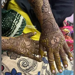 This design for an engagement bride features the couple's initials 'A' and 'S' hidden within the floral patterns.