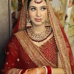 A stunning close-up of our bride's makeup. The focus here is on the blended smokey eye and the perfectly defined brows, creating a look that is both bold and elegant for her big day.
