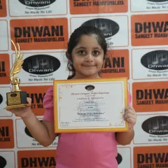 This young achiever's smile says it all. Our goal is to make learning, whether in arts or fitness, a joyful and rewarding experience.