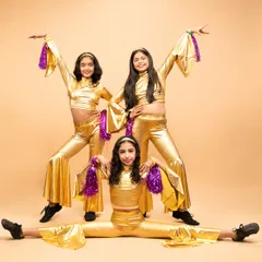 Bringing the funk with our kids' disco jazz performance. Dressed in gold, these young dancers are ready to boogie with pointed fingers, popping hips, and infectious energy.