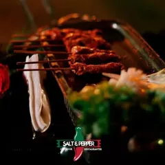 Juicy and flavorful mutton seekh kebabs, fresh off the grill. This is a classic non-vegetarian appetizer that is always a hit at weddings and parties.