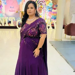 My client looking absolutely regal in this deep purple draped gown. The embroidered blouse and cinched waist create a flattering silhouette that's both traditional and modern.