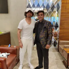 A photo with the incredible singer Sonu Nigam after a private magic performance at the Adani lounge. It's always a pleasure to entertain such a talented artist.