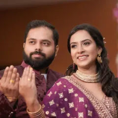 A candid shot of the couple during their engagement ceremony, their happy expressions showing the joy of the moment. We focus on capturing these unposed, genuine reactions.