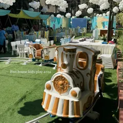 All aboard the fun express! Our white and gold kids' train ride is a magical addition to any party, providing endless entertainment. It's a fantastic centerpiece for outdoor events and a guaranteed hit with children of all ages.