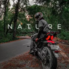Finding peace on the forest trails of North Bengal. A rider takes a moment to soak in the nature on a solo leg of a longer tour.