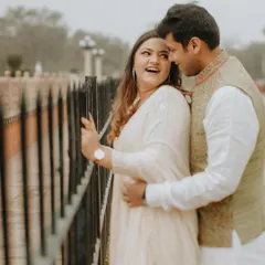 A moment of pure, unscripted laughter between a couple. This candid shot is a perfect example of how I capture the genuine connection and happiness that makes your story unique.