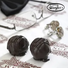 A treat for Father's Day. Two of our classic dark chocolate truffles, a simple, elegant, and delicious way to show appreciation.