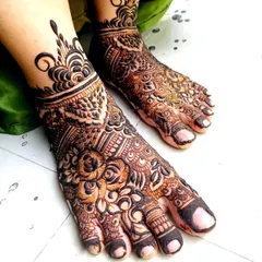 The rich, dark stain of the bridal feet henna, showing how beautifully the design develops with my organic paste.