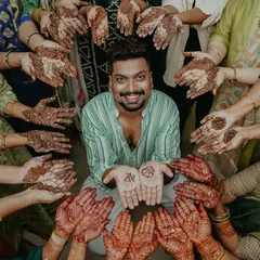 This picture is everything ❤️. Seeing the groom surrounded by his family, all showing off their henna, is what makes my job so special. It’s not just about the design, it’s about the joy and the memories we create together.