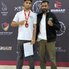 Head coach with our bronze medalist at the Asian Youth Championship in Bahrain. We are there for our fighters every step of the way, from the training room to the victory stand.