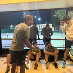 A candid moment of discussion and laughter. Our approach is to keep things light and enjoyable, ensuring the focus remains on stress relief and building genuine connections.