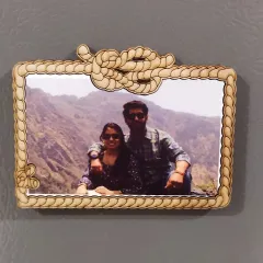 A close-up of the horizontal rope-themed fridge magnet. The intricate knot detail is laser-cut from wood, framing your printed photo beautifully.
