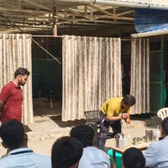 A live demonstration of a Shuddhi Kriya technique for an audience of medical students. We believe in experiential learning, allowing future healthcare professionals to witness and understand these traditional practices firsthand.