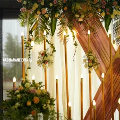 A detailed look at the lighting and floral elements of our modern stage decor. We use a mix of fresh flowers, green foliage, and warm lights to create a romantic and inviting atmosphere.